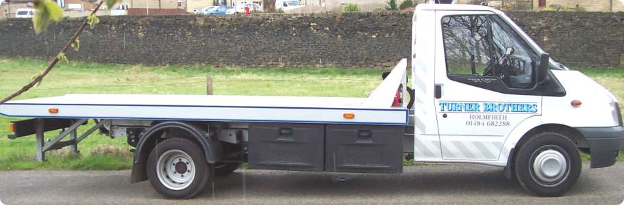 Tilt and slide vehicle loader for a 3.5T to 6T Chassis with a payload of up to 2500Kg
